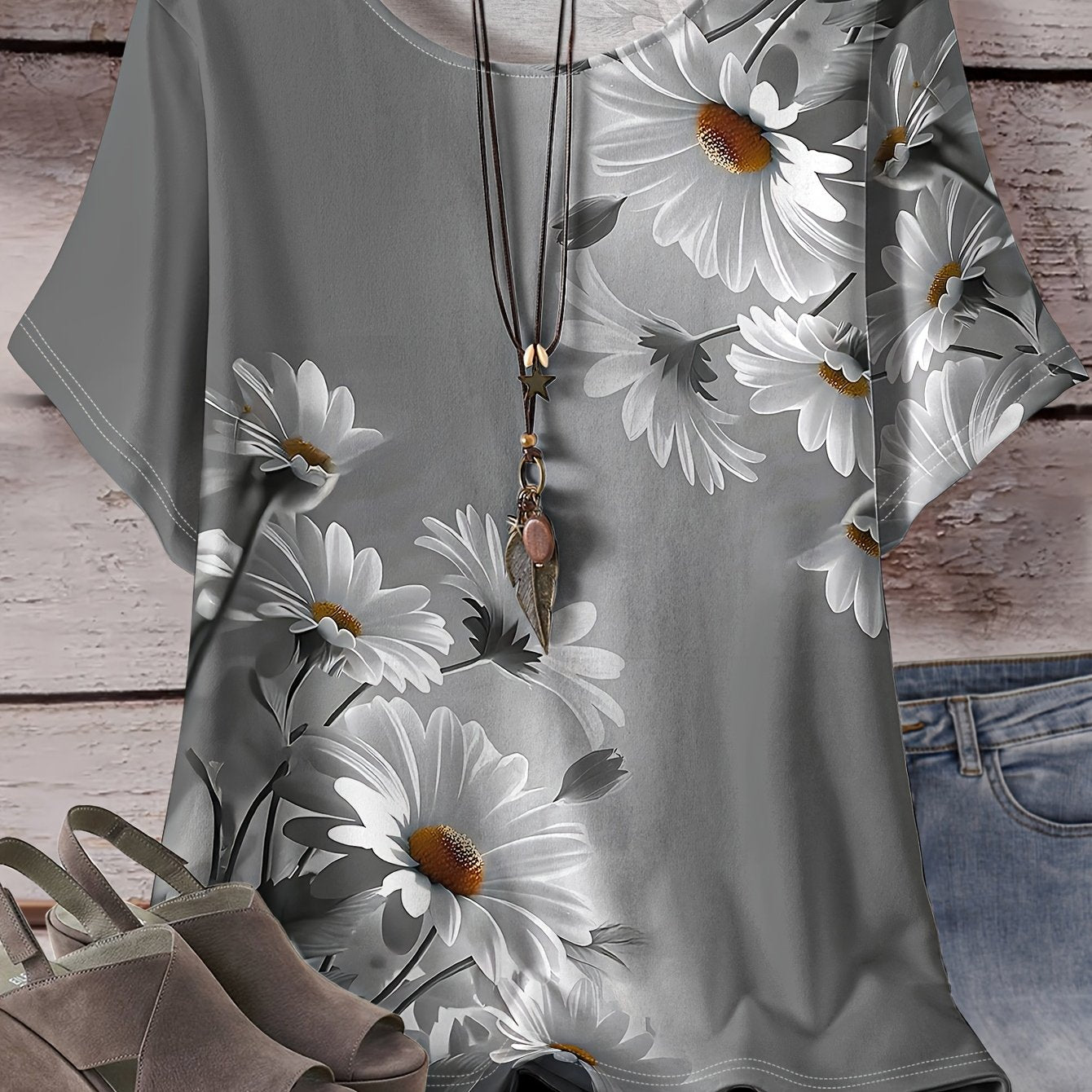 Soft, stretchy polyester blend daisy print t-shirt for plus size women in heather gray. Machine washable.