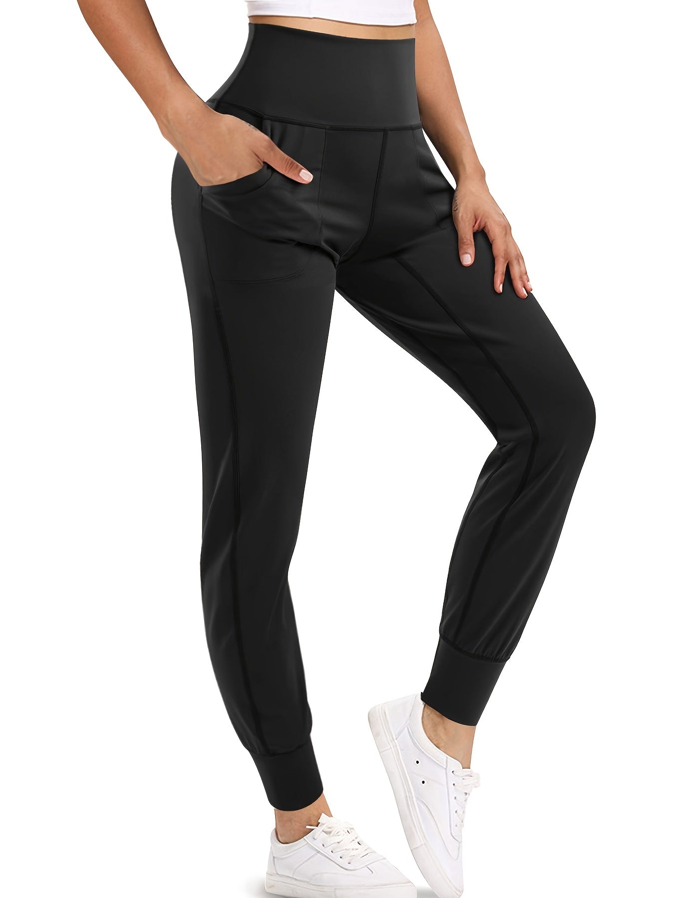 Shaping high-waist sporty pants for women, providing tummy control and support.