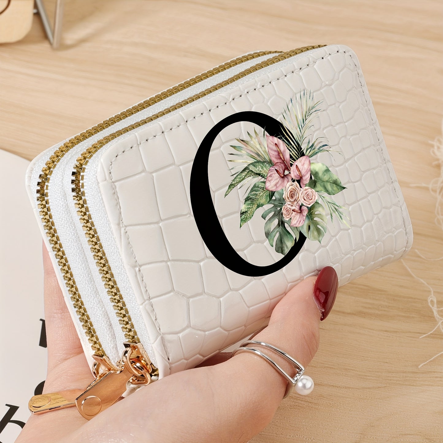 Women's credit card wallet with elegant floral letter print in black & white. Features large capacity, dual zipper, crocodile texture PU, lightweight design with nylon lining for everyday