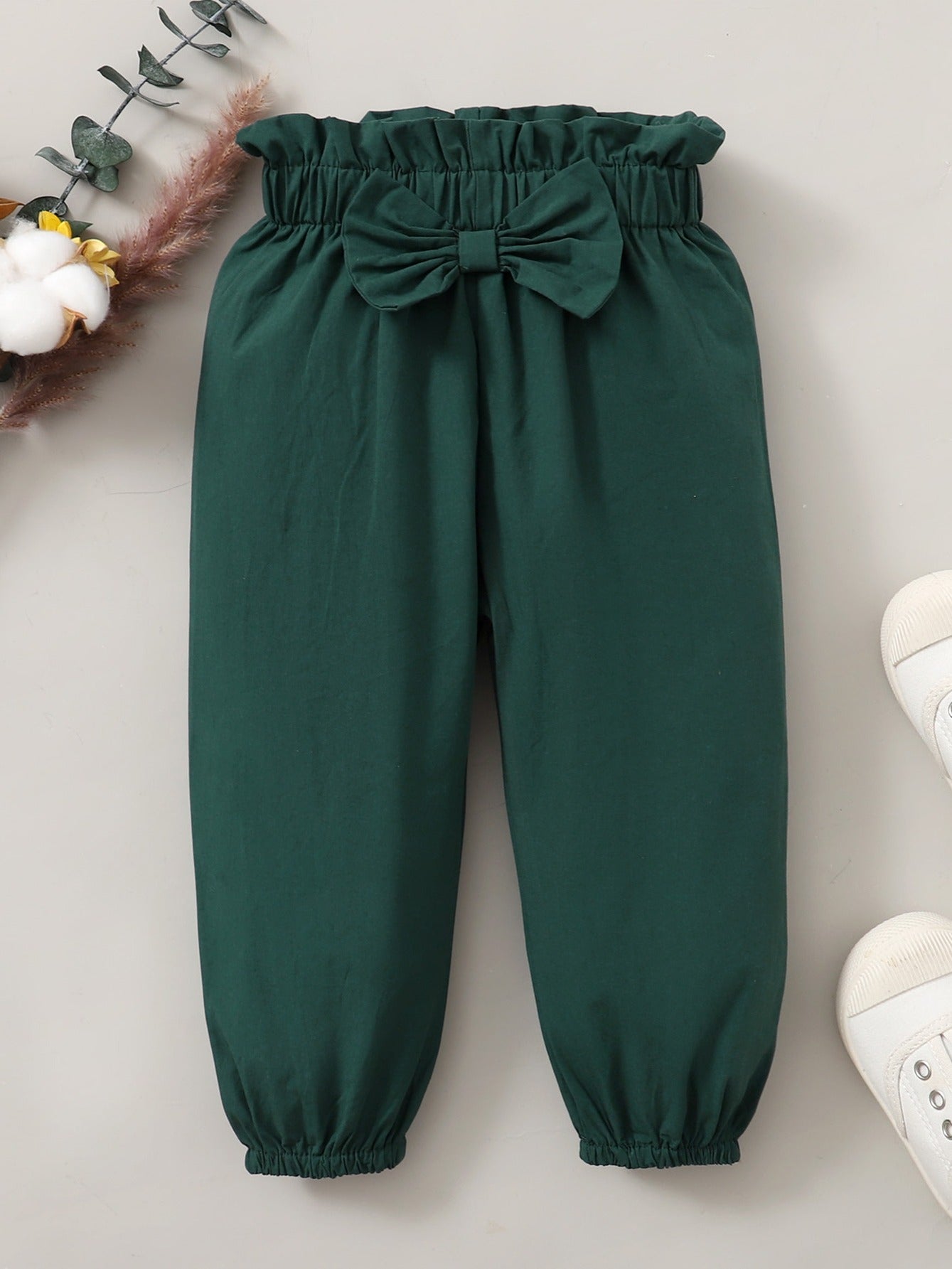 Two-piece set with lace trim top and pants for girls.