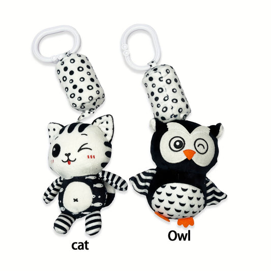 Black and white rattle wind chime for visual training in babies, perfect for early education and development. Makes a great gift for babies and toddlers.