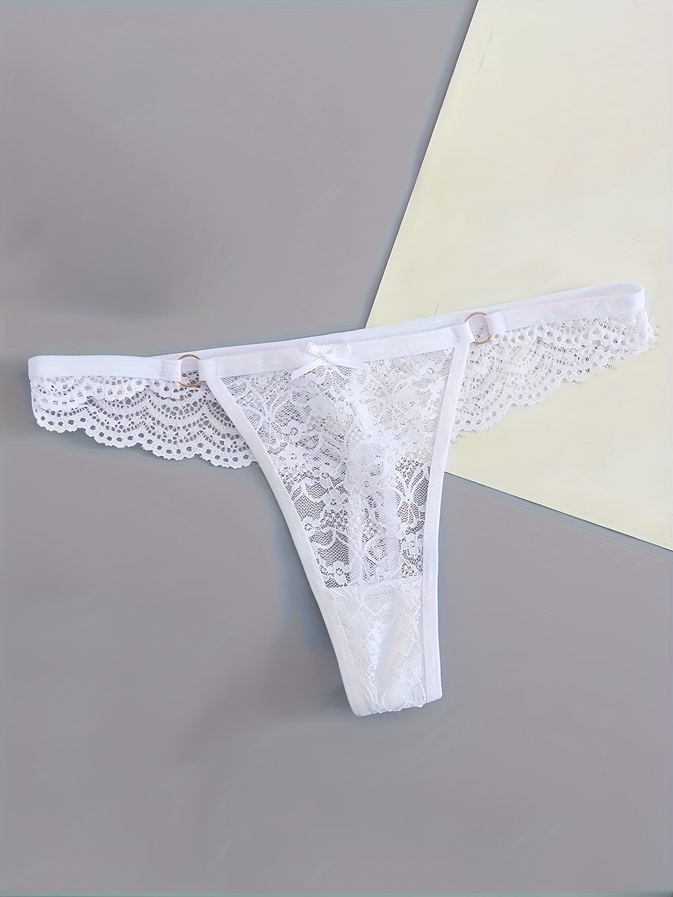 Women's low waist thong panty, pack of 6, with lace.