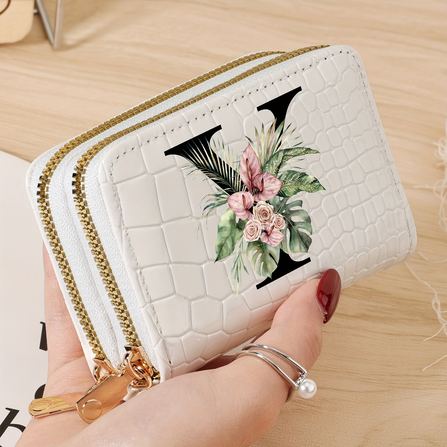 Women's credit card wallet with elegant floral letter print in black & white. Features large capacity, dual zipper, crocodile texture PU, lightweight design with nylon lining for everyday