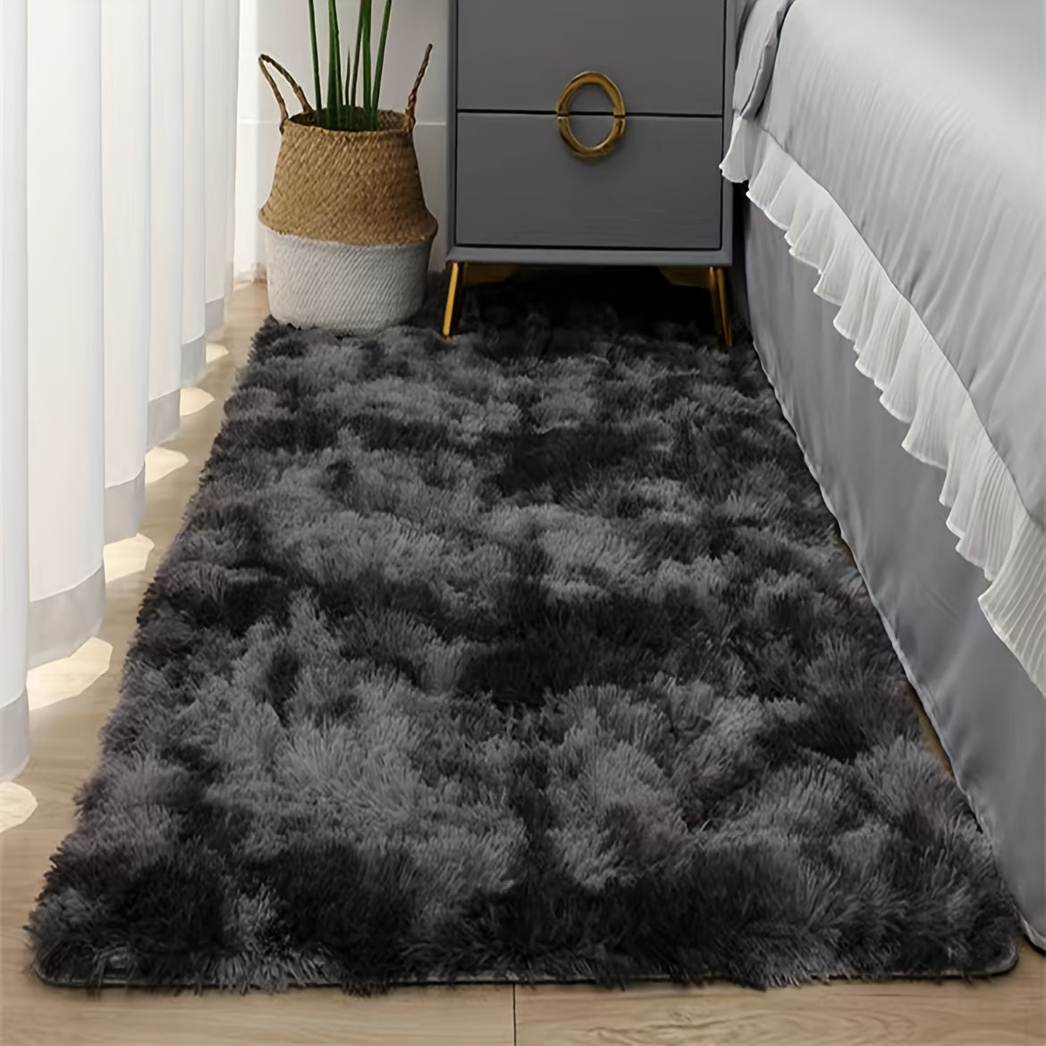 Soft and hand-washable, this plush bedroom rug features a trendy tie-dye design, made from cozy polyester materials to enhance your home decor.