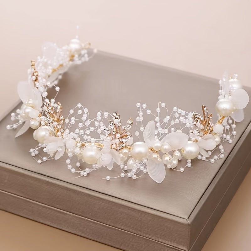 Vintage-style faux pearl flower tiara for brides, fairy princesses, and boho brides. Add a touch of elegance to your wedding hair with this beautiful headband.