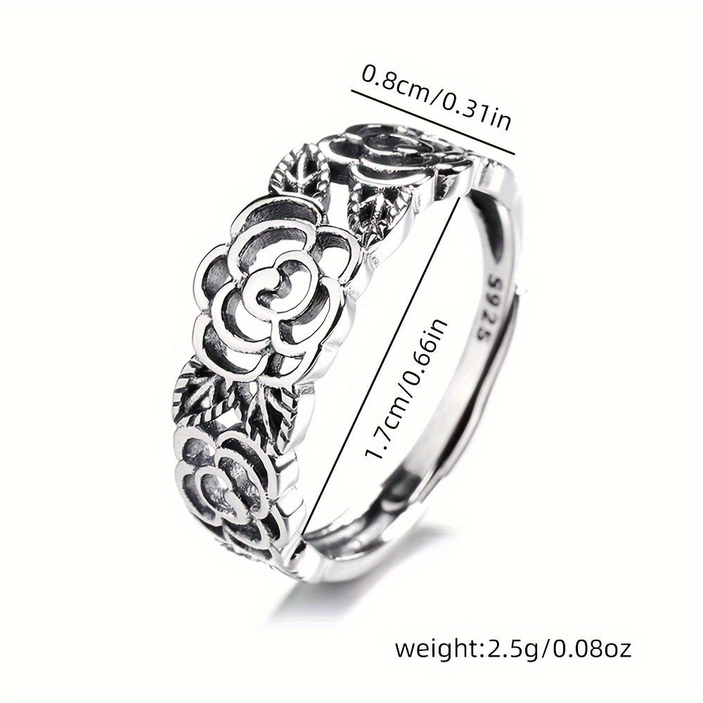 Retro sterling silver ring featuring a hollow rose flower design with an ethnic flair, perfect for literary-inspired ladies looking to add a unique touch to their daily or party outfits. Lightweight at about 2.5g.