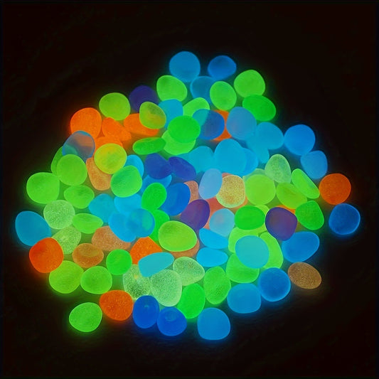 100 pieces of glowing decorative rocks made from fish-safe ABS material for aquariums, gardens, bonsai plants, and outdoor decor.