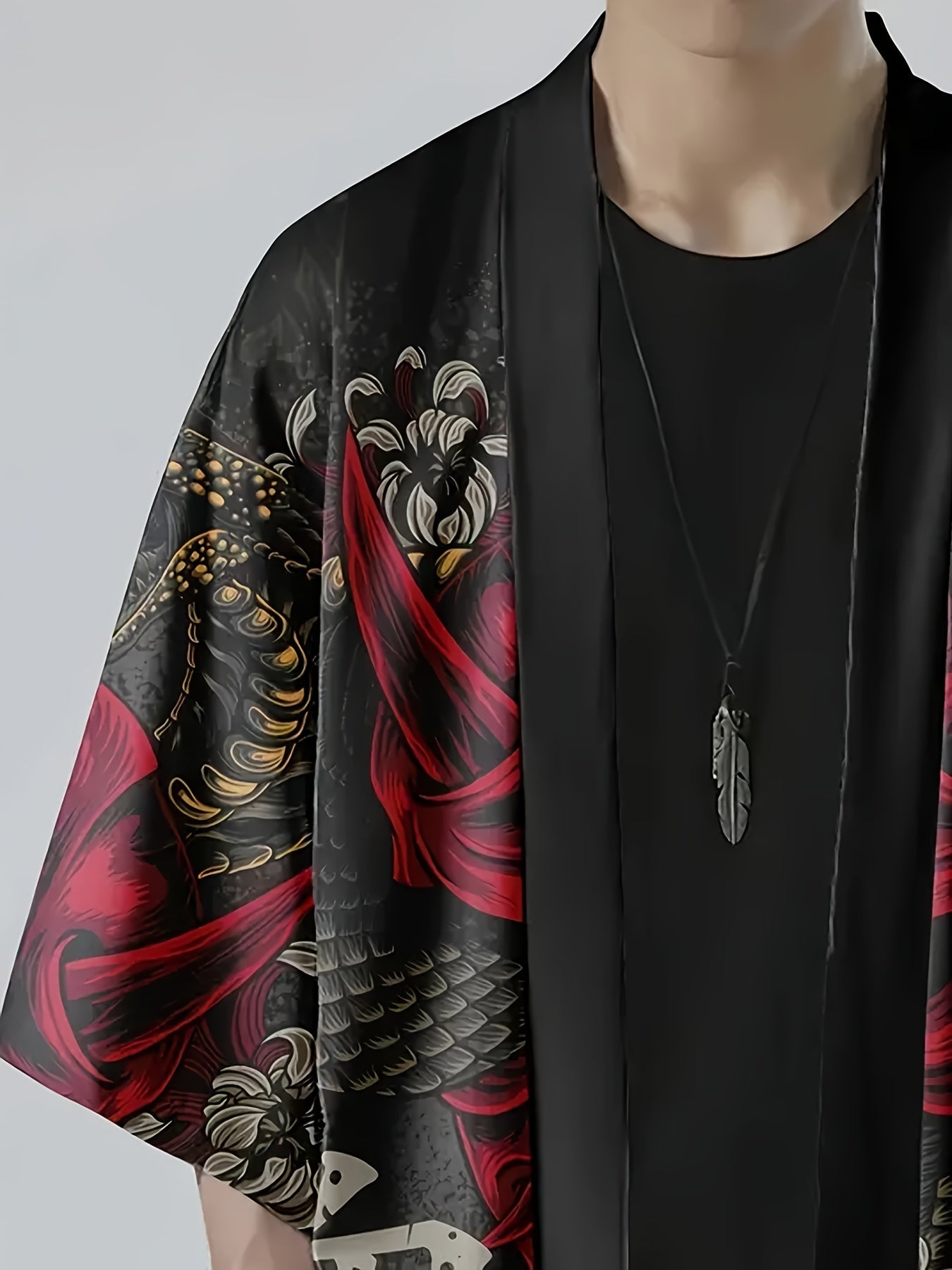 Japanese-style kimono shirt for men with ghost and snake illustration pattern, three-quarter sleeves, and open placket. Perfect for summer streetwear.