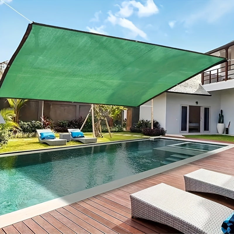 Large green sunshade net for outdoor use in pool, garden, or balcony. Water-resistant fabric, suitable for all seasons, with hook and loop closure.