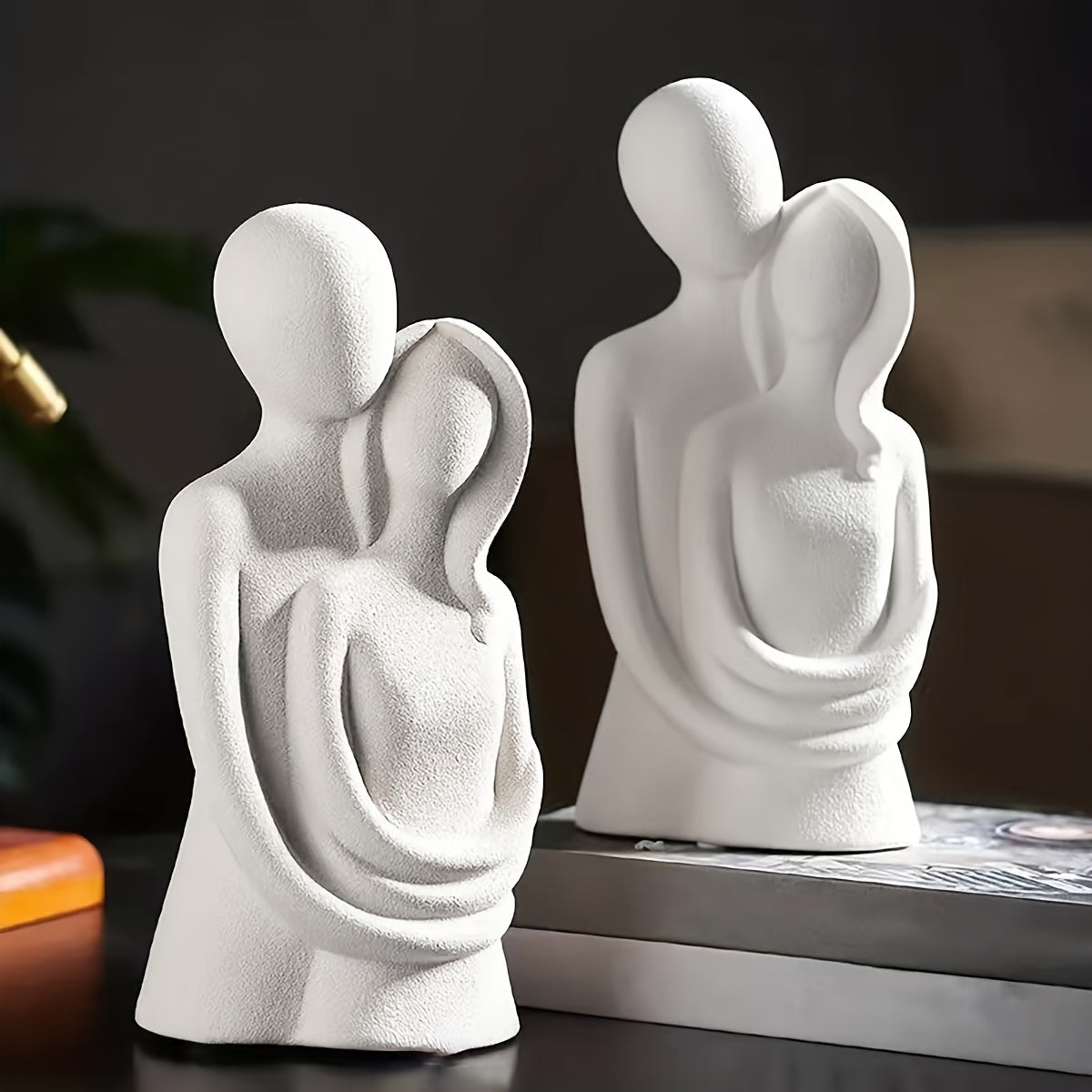 Abstract couple sculpture for indoor/outdoor decor.