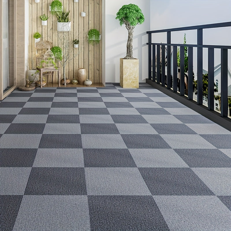 Pack of multiple self-adhesive carpet tiles in a square shape, suitable for both office and home use. These non-slip foam backed polyester rugs are machine-made with a solid pattern, making them perfect for enhancing the decor of any room, office, or