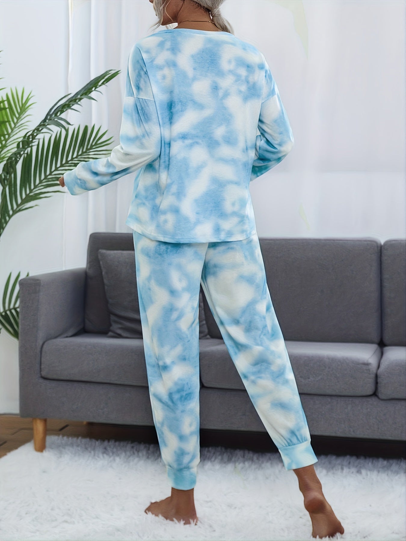 Tie dye lounge set for women, with long sleeve top and elastic waistband pants.