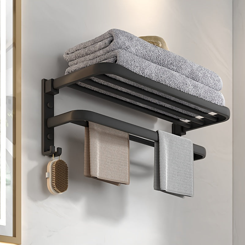 Compact black wall-mounted bathroom shelf with towel bar and hooks for convenient storage of towels, toiletries, and accessories. Easy to install with a sleek modern design and sturdy metal construction. Perfect towel holder for any bathroom.