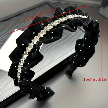 Black velvet headband with rhinestone embellishments, ideal for weddings and formal events.