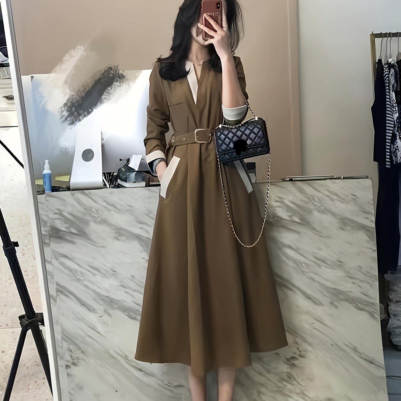 Stylish midi dress in solid brown polyester with V-neck, A-line cut, belt, and long sleeves. Suitable for spring, summer, or fall, and is machine washable.