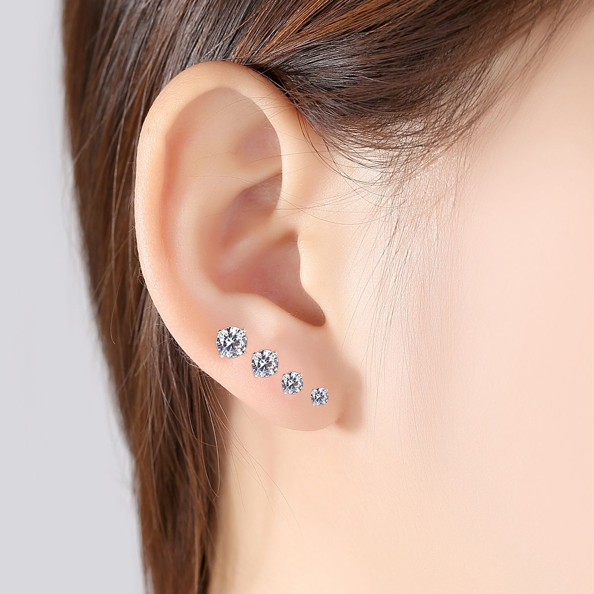 Set of three pairs of stud earrings in 925 silver for women, in sizes 4mm, 5mm, and 6mm.