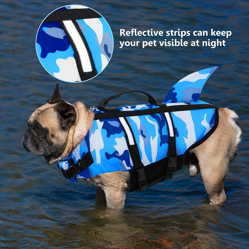 Adjustable lightweight dog life vest with rescue handle, featuring shark design for outdoor surfing and beach activities.