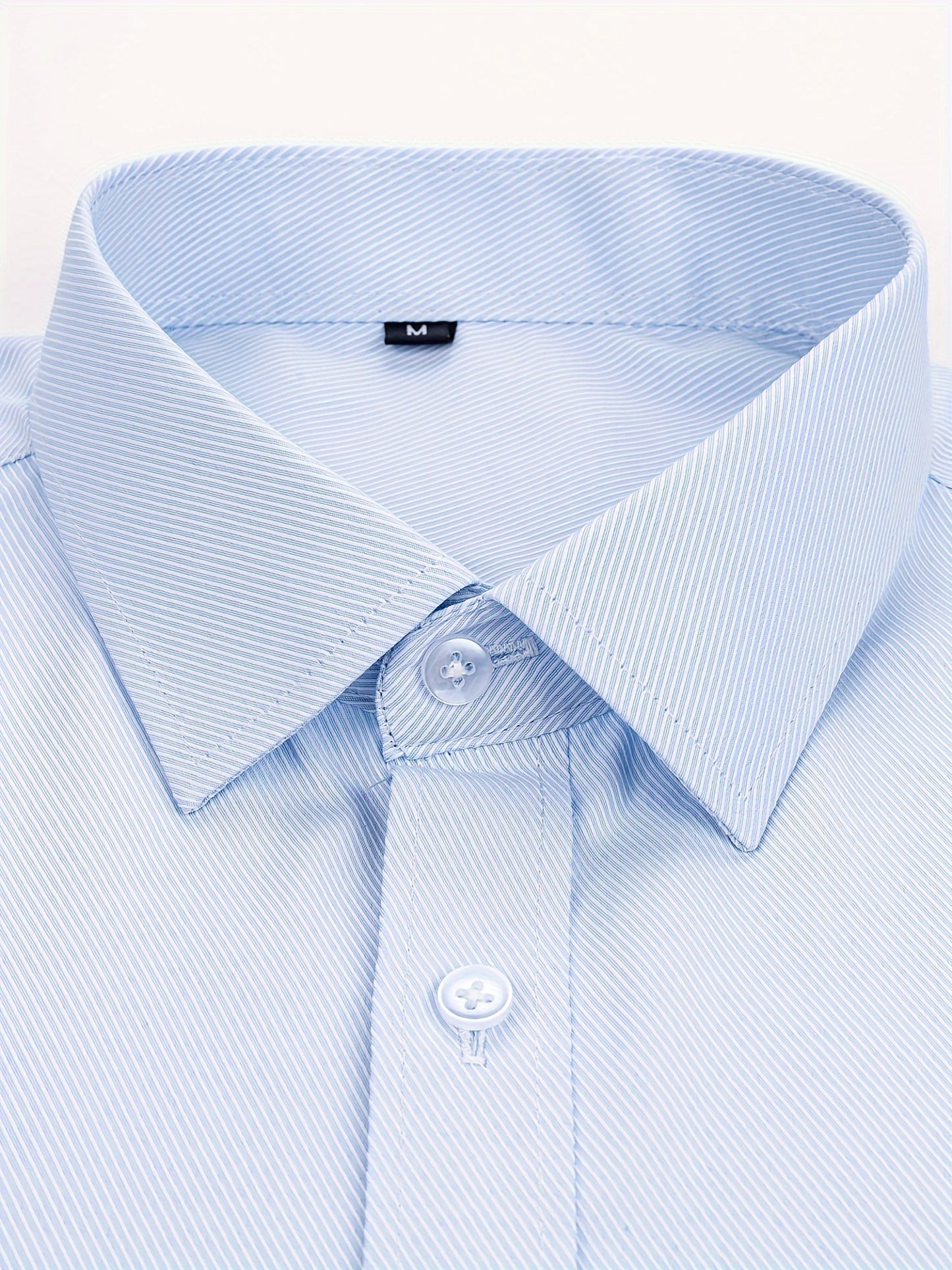 Men's classic long sleeve button up dress shirt in solid color, perfect for business and formal events.