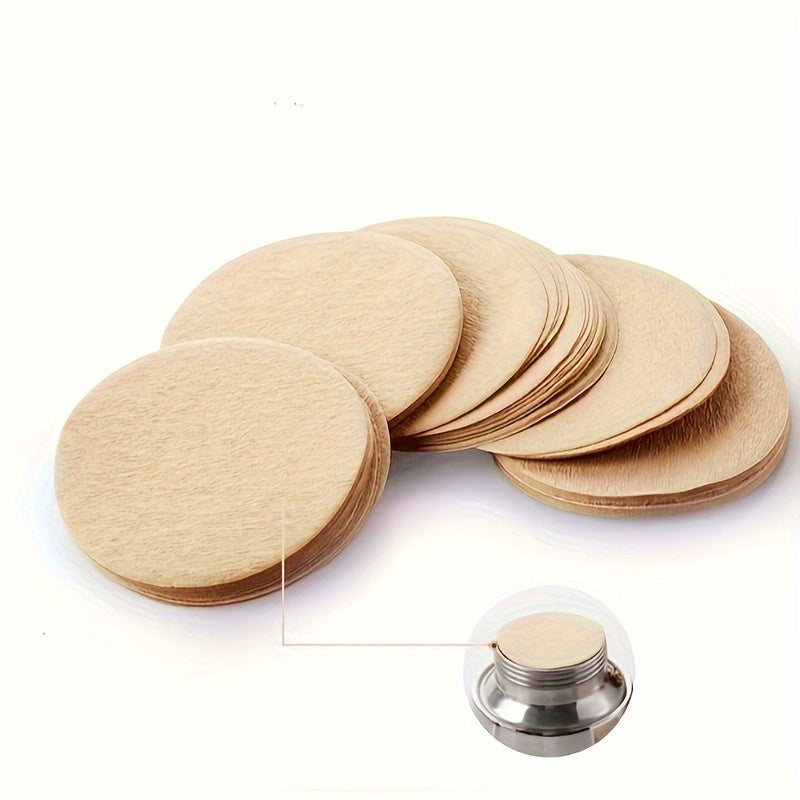 100 pieces of Round Coffee Filter Papers in Original Colors, available in sizes 51mm, 53mm, and 58mm. Made of Paper material with 1 layer. Designed for use in Espresso Machines and Coffee Makers.