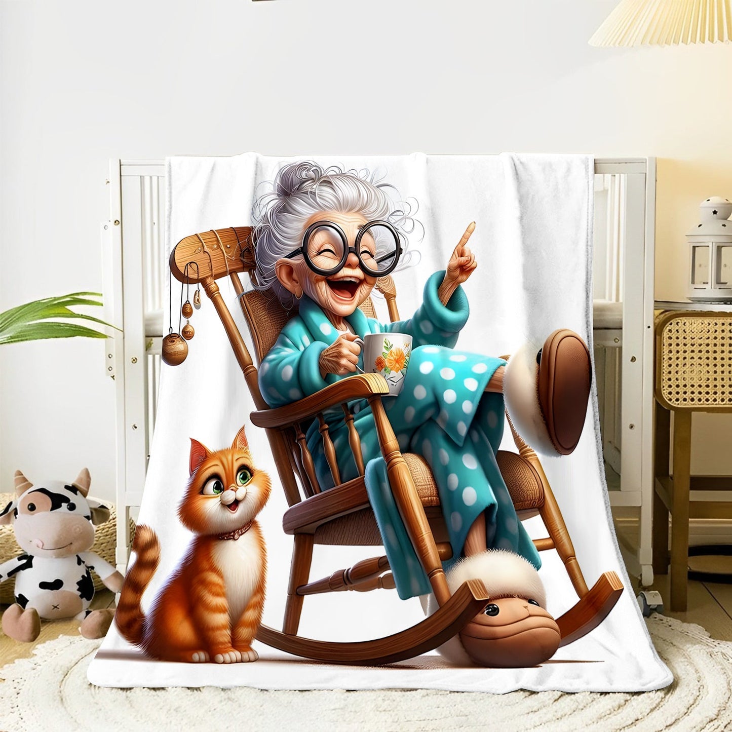 Stay warm and cozy with the 1pc Cozy Senior Life Flannel Throw Blanket featuring a charming Grandma in Rocking Chair with Cat print design. This contemporary style blanket offers all-season comfort with its knitted polyester material. It's the ideal gift