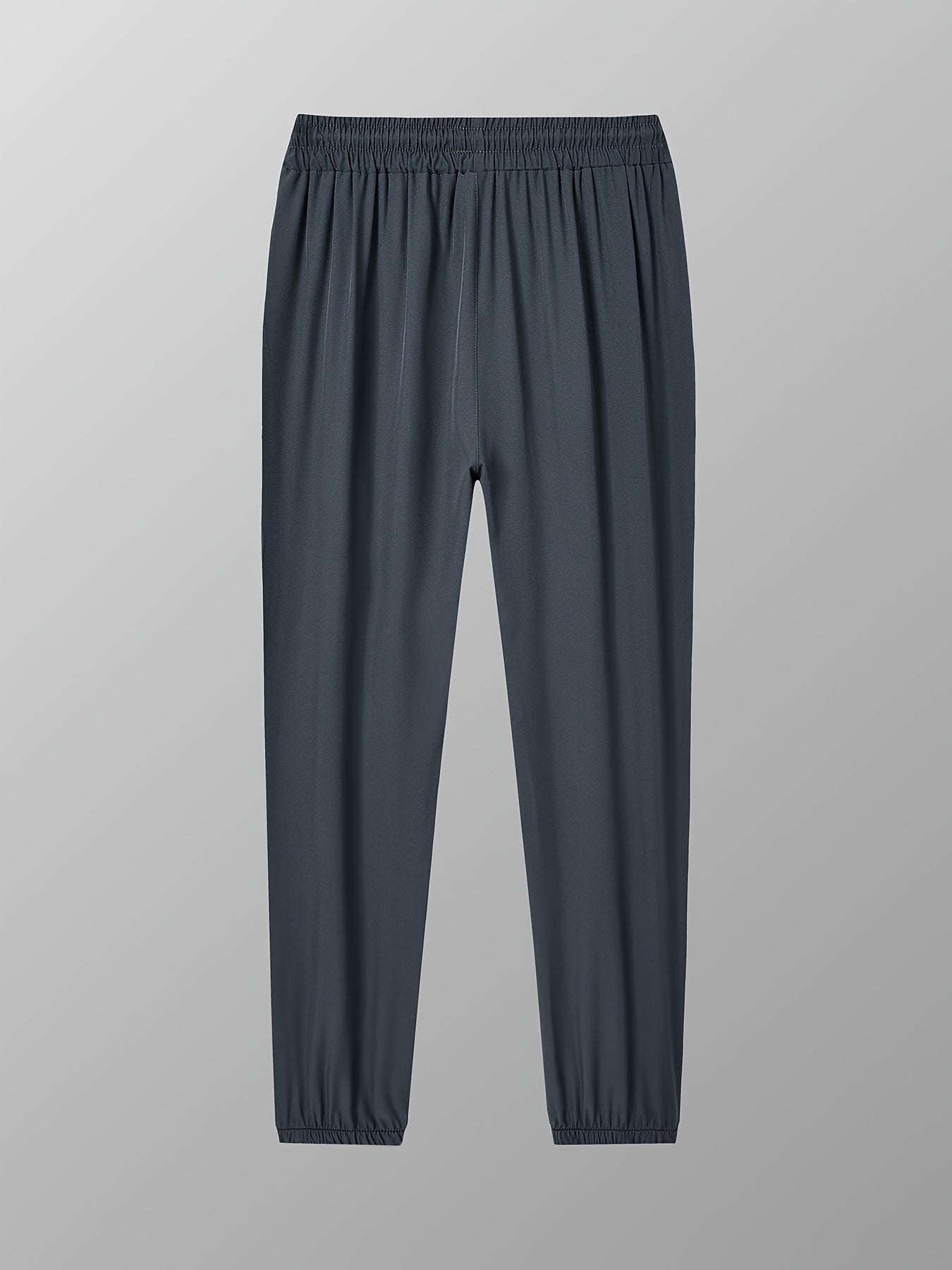 Men's drawstring trousers with pockets for outdoor activities in spring and summer.