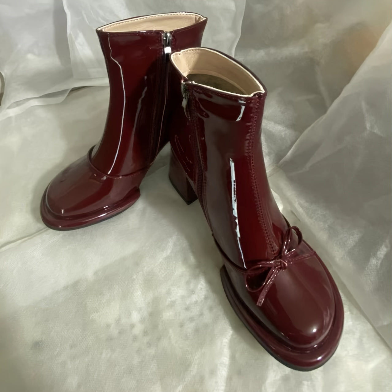 New women's short boots with thick heel and round toe for 2024.