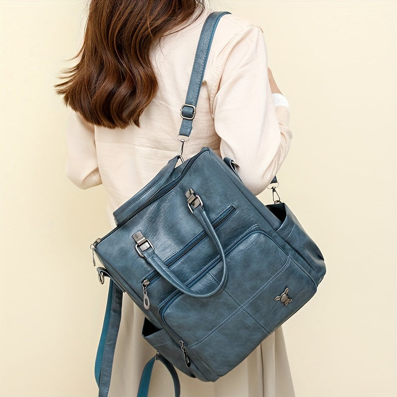 Chic faux leather backpack with removable strap, versatile shoulder bag in multiple colors.