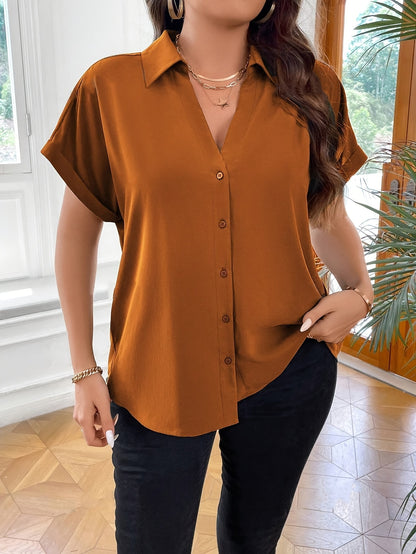 Plus size solid collared blouse with short sleeves and button details, perfect for spring.