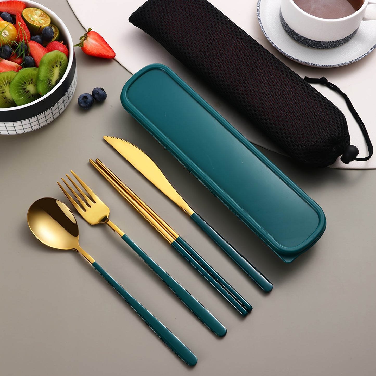 Stainless steel cutlery set includes knife, fork, spoon, and chopsticks in portable case for picnics, camping, lunches, and gatherings.