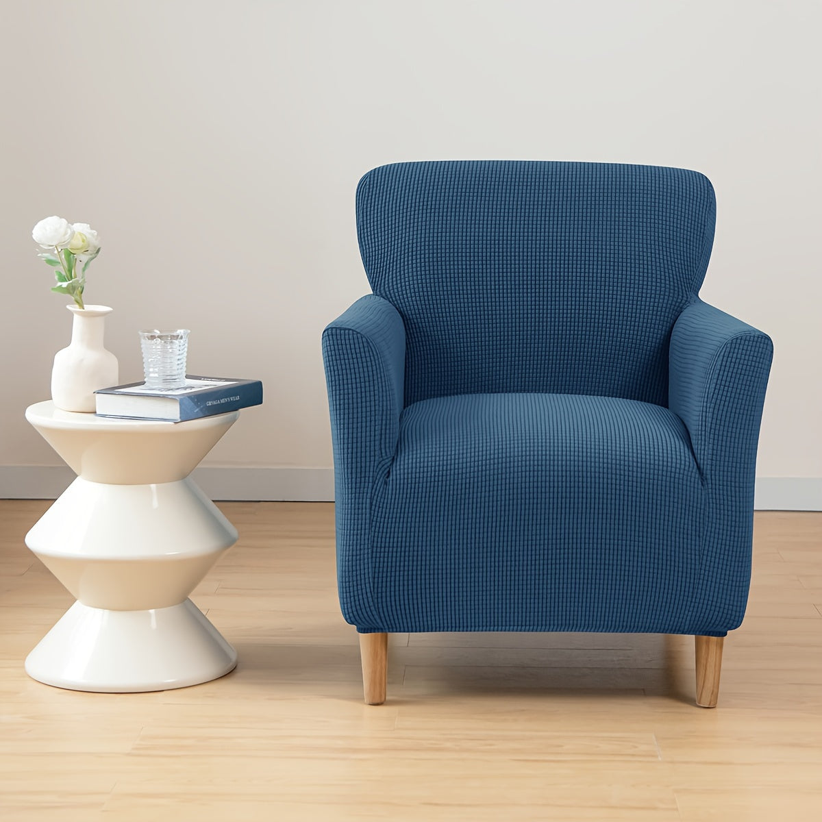 Modern armchair slipcover with slip-resistant design, machine washable polyester/spandex, and elastic-band closure - fits standard armchairs.