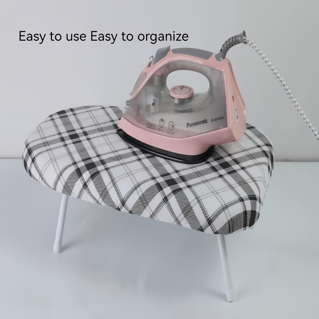 1 piece of Home Ironing Clothes Collar Cuffs that can be used at the Office, for Leisure activities, and for ironing on the Dining Table. It is a Foldable Ironing Board.