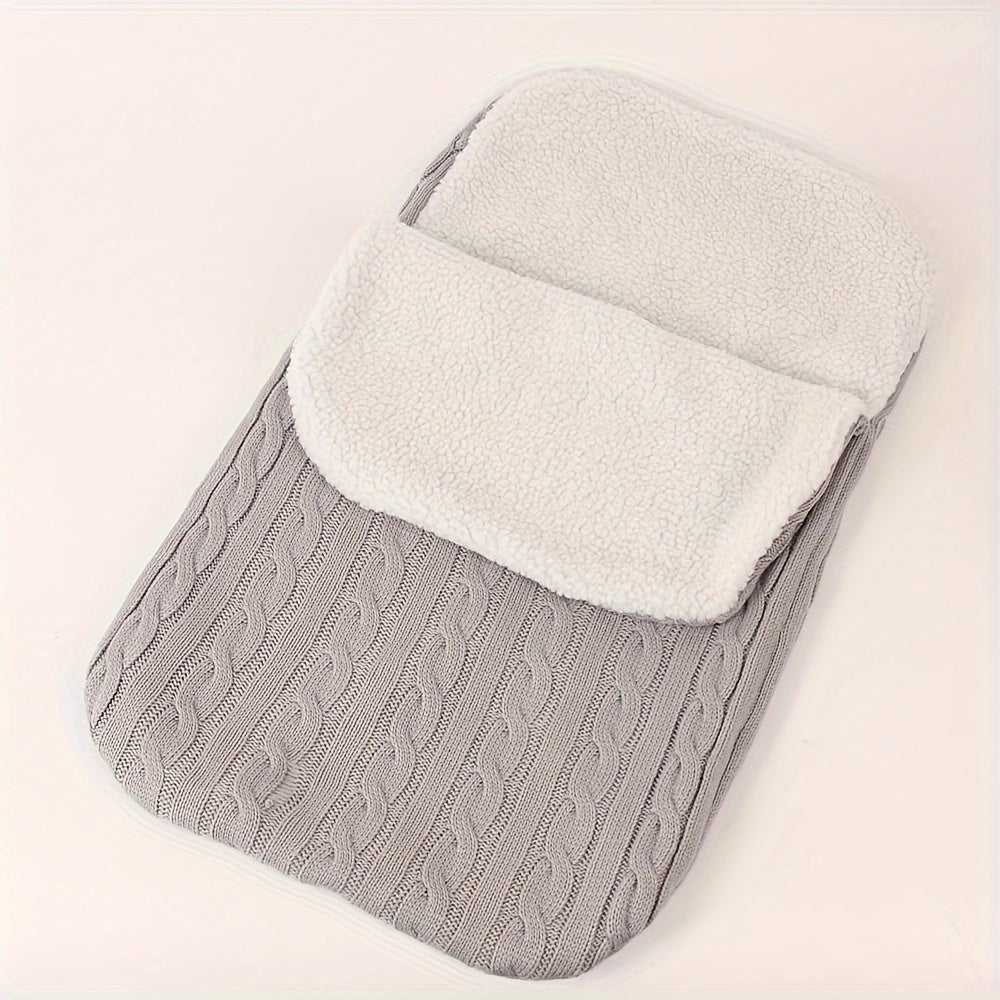 Machine washable baby foot cover with knitted microfiber filling for warmth and comfort.