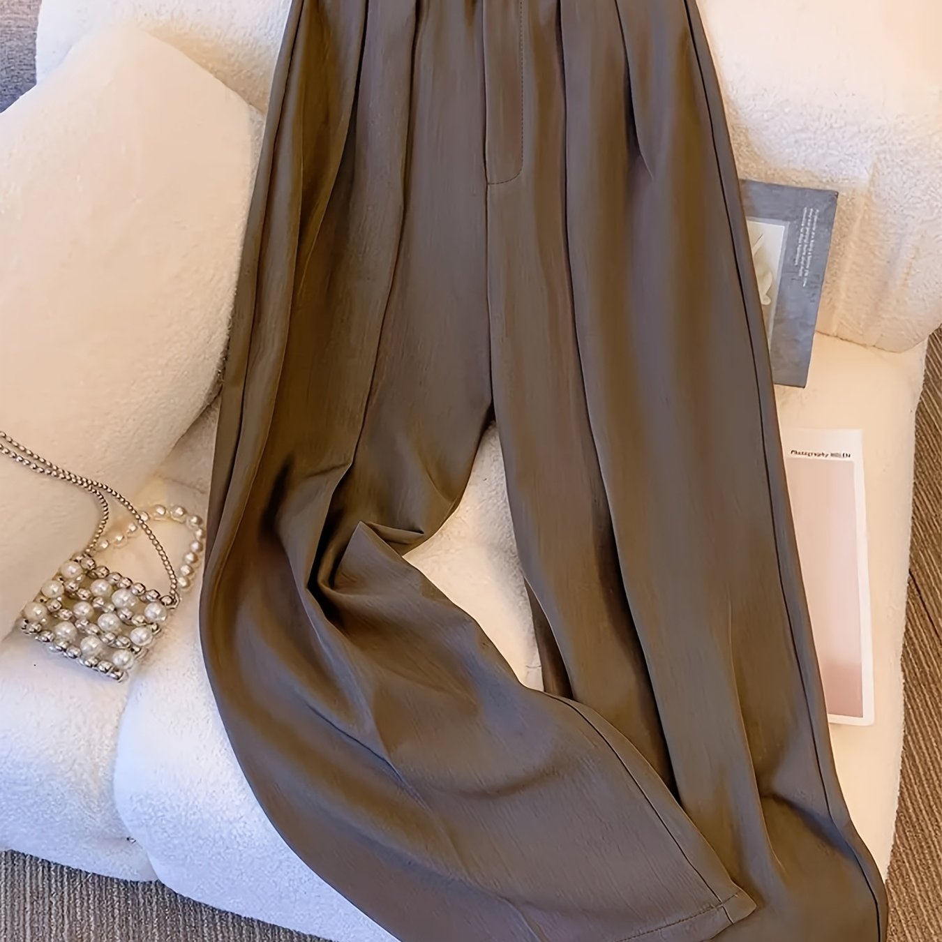 Stylish, high-waist wide-leg pants for women with zipper closure, solid color, made of polyester, machine washable. Features chic pleated design for versatile wear.