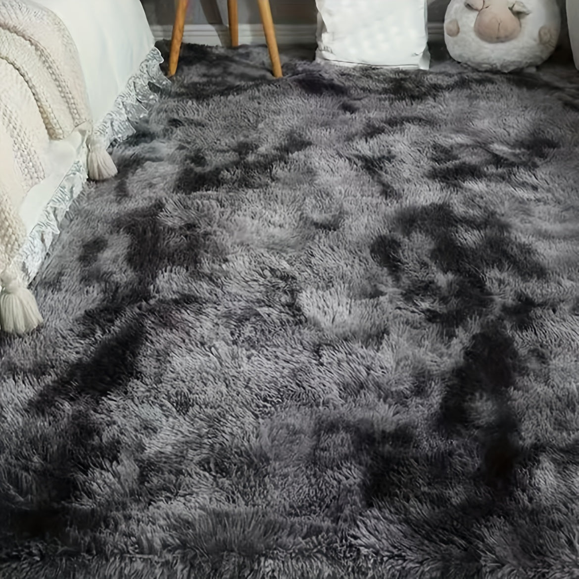 Soft and hand-washable, this plush bedroom rug features a trendy tie-dye design, made from cozy polyester materials to enhance your home decor.