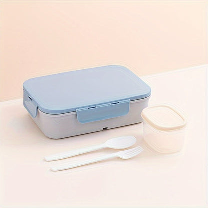 A leak-proof, microwaveable Japanese-style lunch box with compartments, perfect for students and office workers on the go. This high-quality plastic container is ideal for travel and can hold a large amount of food.