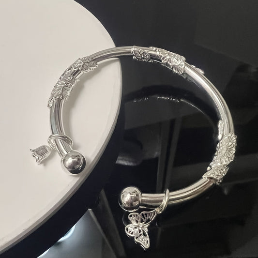 Vintage Style S999 Silver Butterfly Bracelet with Adjustable Floral Carved Design - Perfect for Daily Wear and Gifting on Christmas or Valentine's Day. Can be worn as a Hand Chain in a Palace Style.