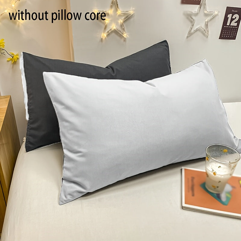 Basic set of 2 rectangular pillowcases made of 90g solid color fleece material, featuring an envelope closure design. These pillowcases are ultra soft, breathable, and machine washable, suitable for use in bedrooms, guest rooms, hotels, and more. The