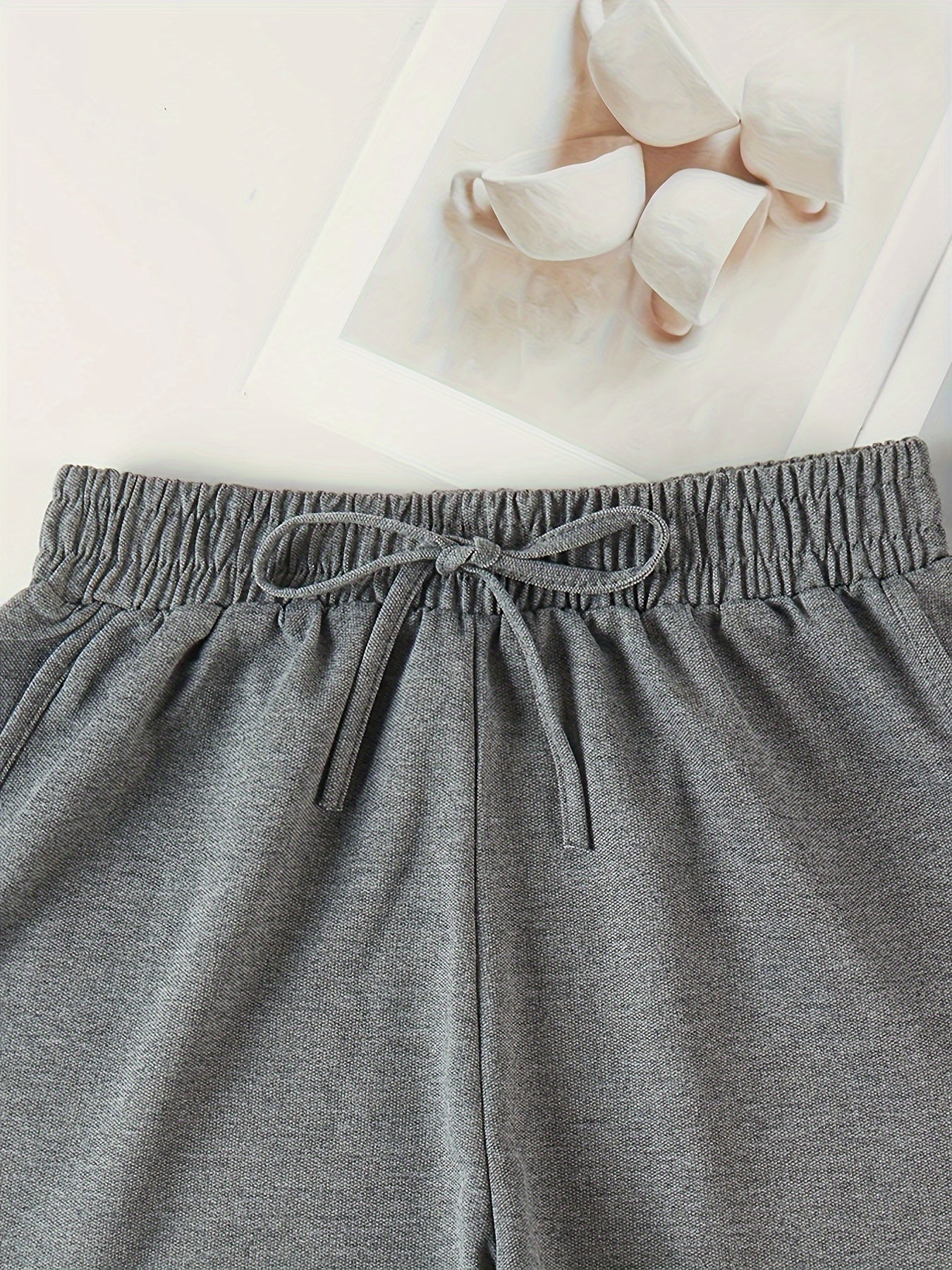 Lounge bottoms with elastic high waist for women's sleep and lounging.