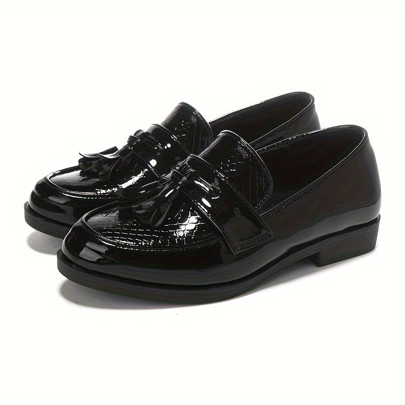 Men's casual loafers in black with non-slip TPR sole, lightweight slip-on design, tassel detail, and versatile for indoor and outdoor wear.