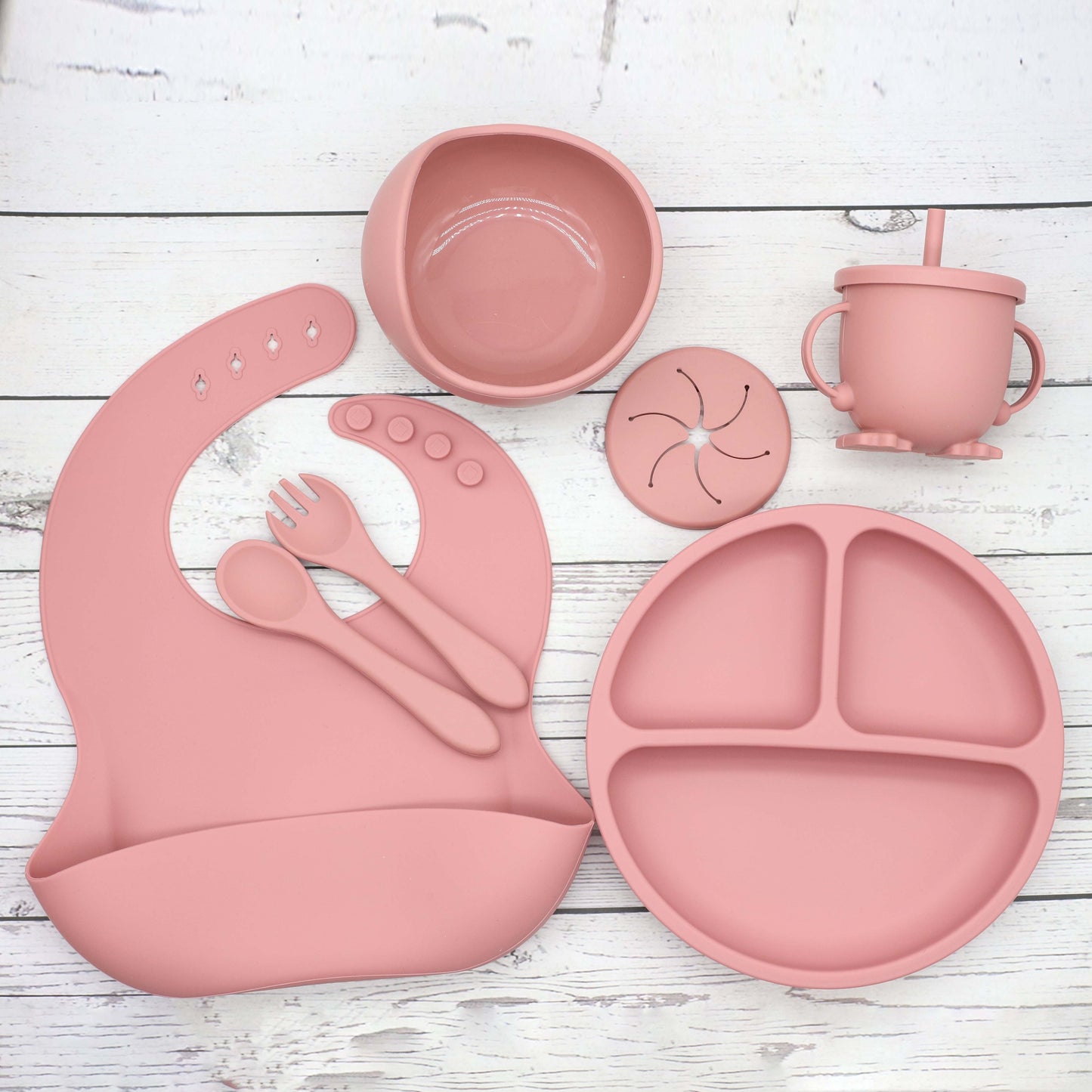 6 piece set of Silicone Feeding Items, featuring a Silicone Bib, Silicone Suction Plate, Silicone Suction Bowl, 2-in-1 Drinking Training Cup. Made of soft and safe, food-grade silicone that is BPA-free. Perfect Easter gift idea.