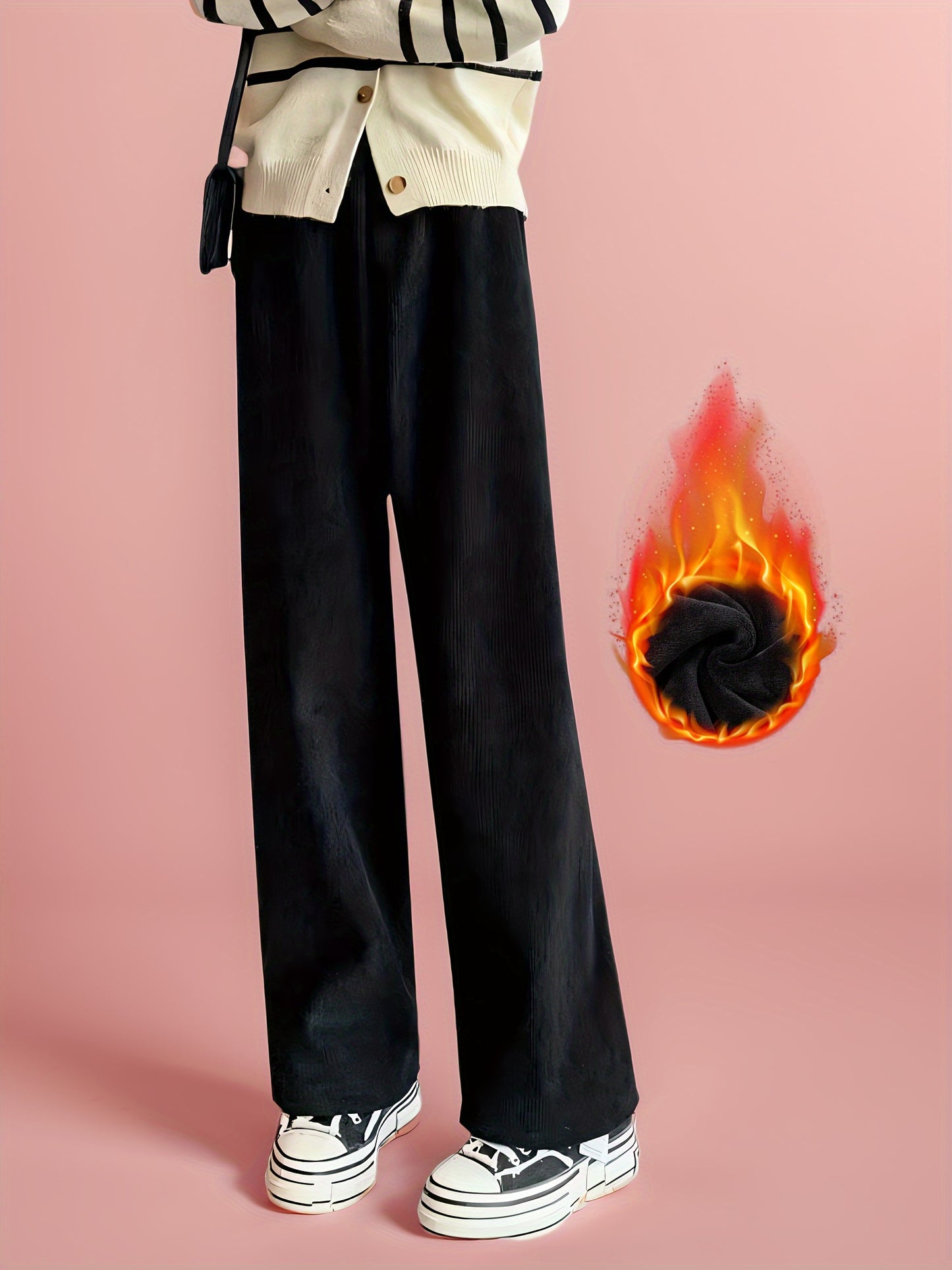 Warm and cozy fleece-lined winter pants for women, with wide legs and soft polyester blend for cold weather comfort.