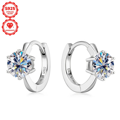 These elegant earrings feature a pair of round Mozambique stones, each 6.5mm in diameter and D color. The stones are set in a single six-prong setting with a 10mm inner diameter, crafted from 925 sterling silver. Accompanied by a GRA certificate, these