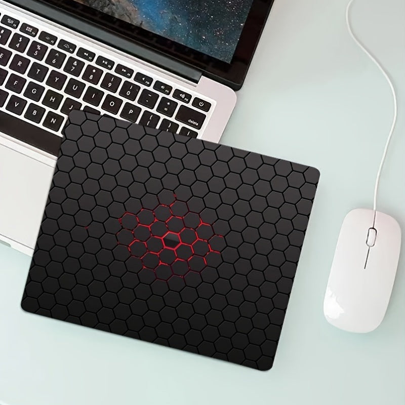 Hexagonal patterned rubber mouse pad for office or gaming, measuring 17.78x21.84 cm.