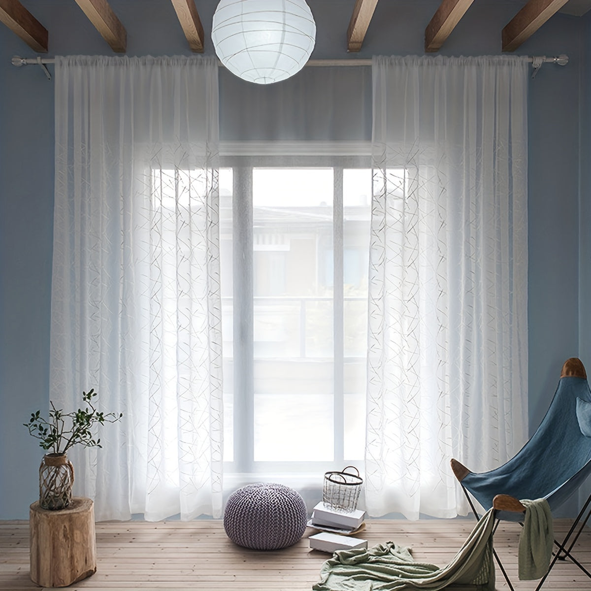 Create a modern and sophisticated look in your living room or bedroom with this 1-piece simple line embroidery sheer curtain. Featuring a sleek geometric design in white, this translucent curtain filters light beautifully while adding a stylish touch to