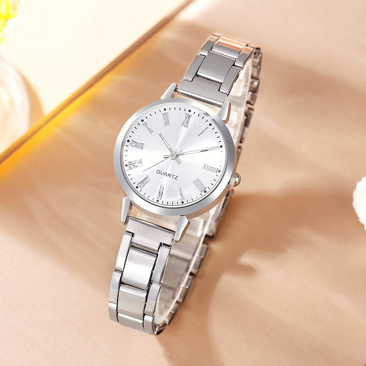 Fashion Quartz watch for women aged 15 and above with alloy strap, round dial, non-waterproof, electronic, chic style.