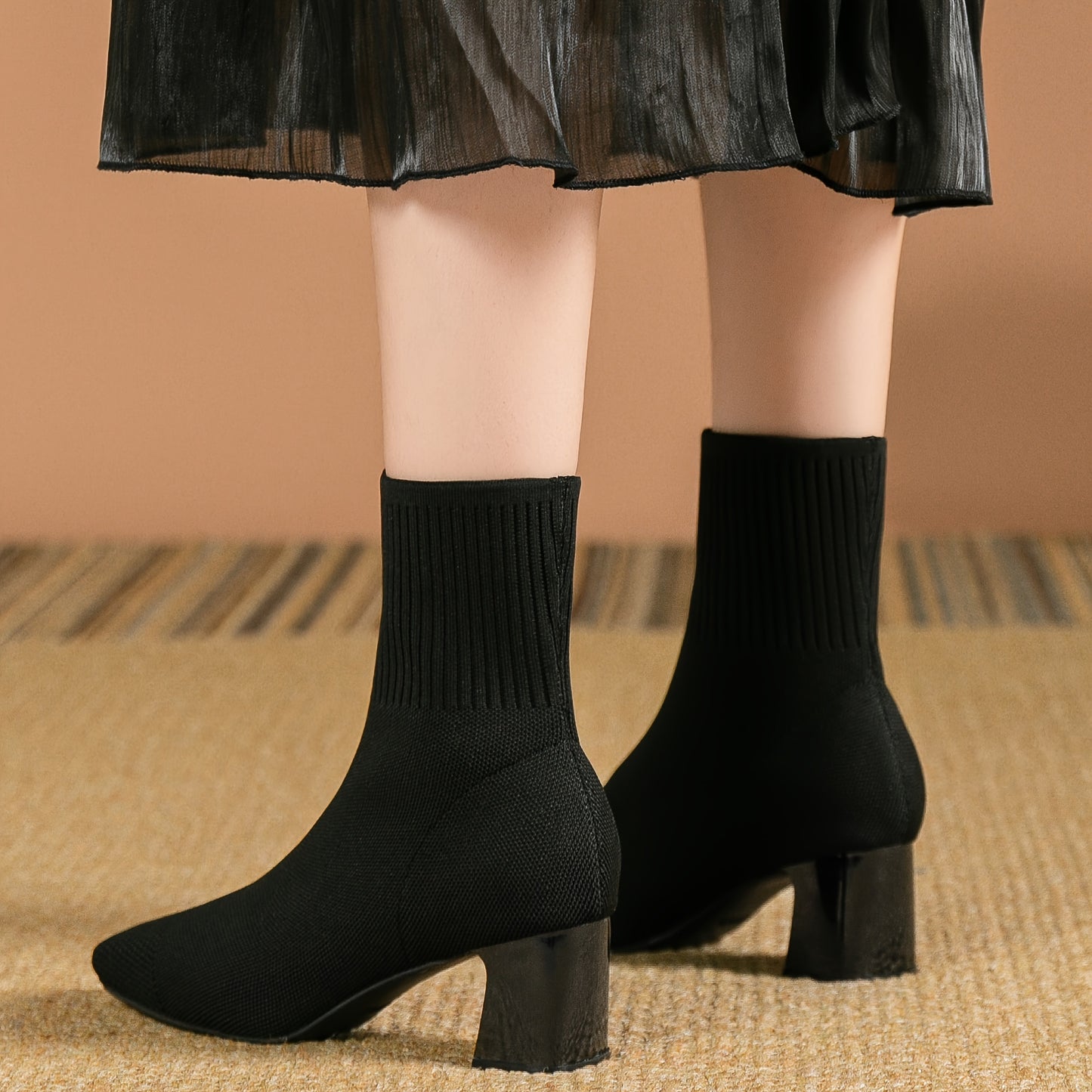 Women's square toe sock boots with high heel, solid color knit design, stretchy slip on style.