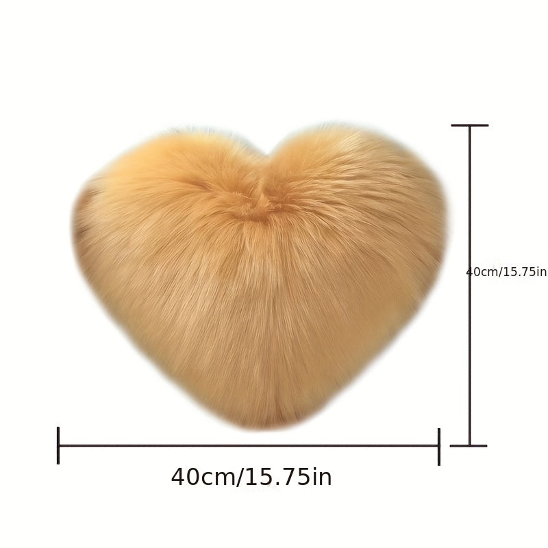 Heart-shaped throw pillow for living room or bedroom, made of long plush material for softness and comfort.