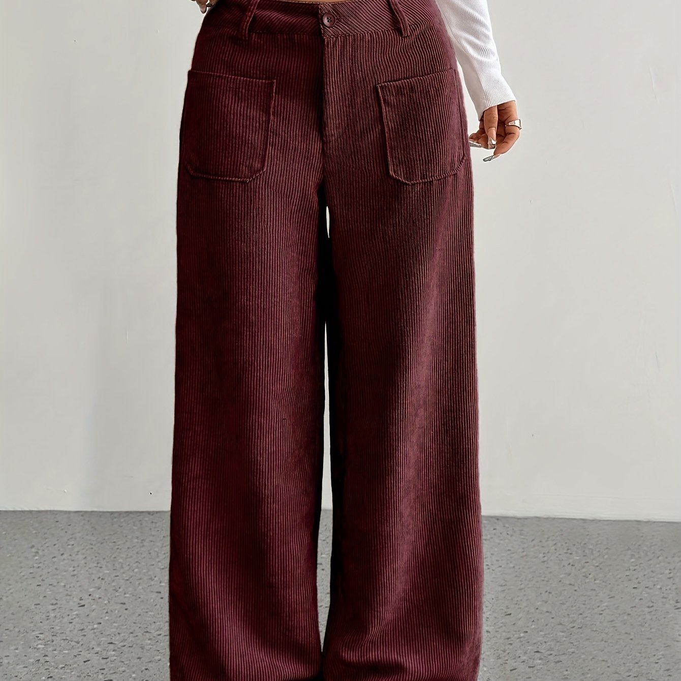 Casual corduroy wide leg pants for women made of polyester, suitable for all seasons.