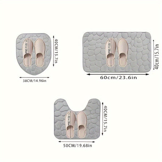 Set of 3 ultra absorbent bath mats with non-slip backing, featuring a stylish sponge stone pattern. Perfect for use in the bathroom, bedroom, or living room to enhance home decor. The set includes a large mat measuring 60.96x40.64cm, a toilet mat