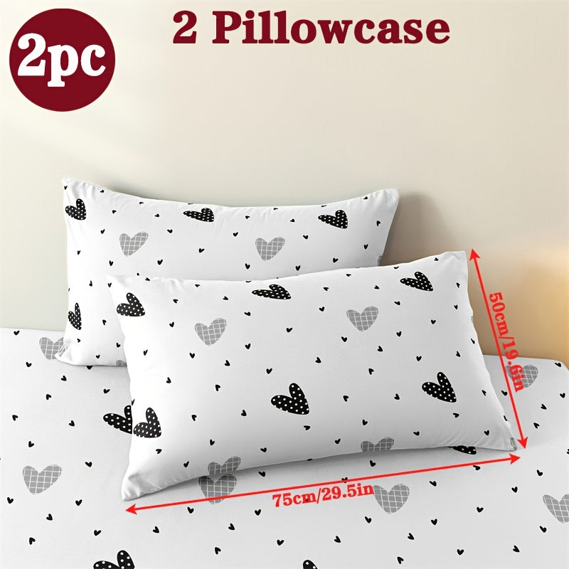 Two geometric print pillowcases made from soft and breathable polyester microfiber. These pillowcases are machine washable and feature an envelope closure for easy use. Perfect for adding a stylish touch to your home bedding, these pillowcases do not